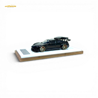 404ERROR Porsche Taycan Black with Roof Box 1:64