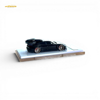 404ERROR Porsche Taycan Black with Roof Box 1:64