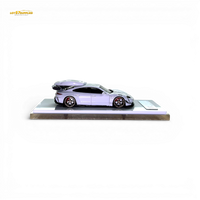 404ERROR Porsche Taycan White with Roof Box 1:64