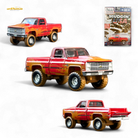 Auto World 1983 Chevrolet Silverado K10 4x4 Muddy Lifted 1:64