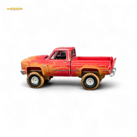 Auto World 1983 Chevrolet Silverado K10 4x4 Muddy Lifted 1:64