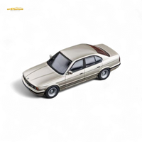 (Pre-Order) DCM BMW E34 5-Series Sedan Cashmere Beagle Gold 1:64
